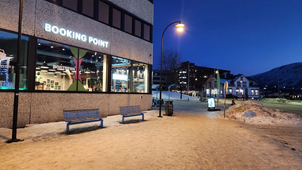 Exterior view of the Northern Shots Tours booking point at Roald Amundsensplass 1A in Tromsø.
