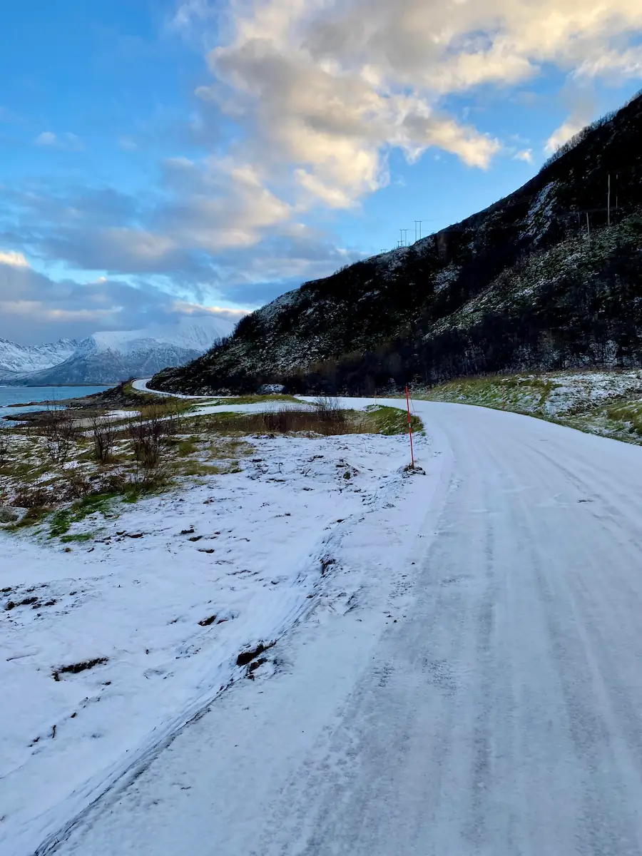 Roadside near Sommarøy covered in the first snowfall of the season.